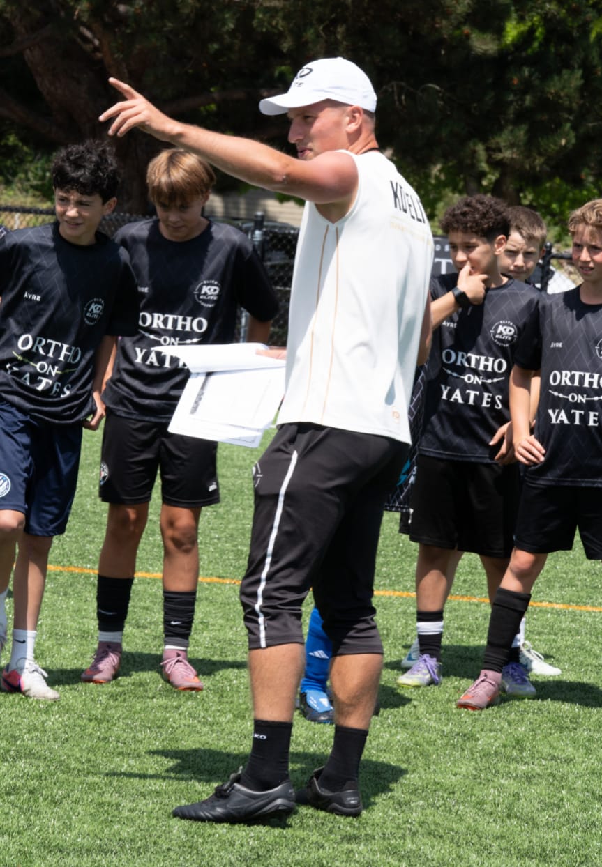 Kyle Degelman coaching players at a KD Elite session